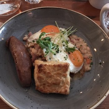 Catch 122 - Dirtier breakfast= eggs, sausage, beans, duck on top of scone-like pastry. - Breakfast & Brunch Near Me - North Vancouver, British Columbia Catch 122 - Dirtier breakfast= eggs, sausage, beans, duck on top of scone-like pastry. - Breakfast & Brunch Near Me - North Vancouver, British Columbia