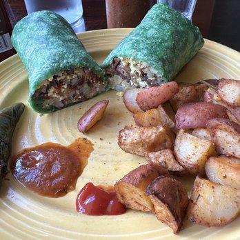 The Grain Cafe - Brekkie burrito on spinach wrap. Tempeh Bacon, tofu, potatoes. Ok. - Vegan Near Me - Long Beach, California The Grain Cafe - Brekkie burrito on spinach wrap. Tempeh Bacon, tofu, potatoes. Ok. - Vegan Near Me - Long Beach, California