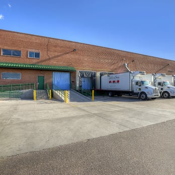 Peddler's Son Produce - trucks parked in front of a building - Fruits & Veggies Near Me - Phoenix, Arizona