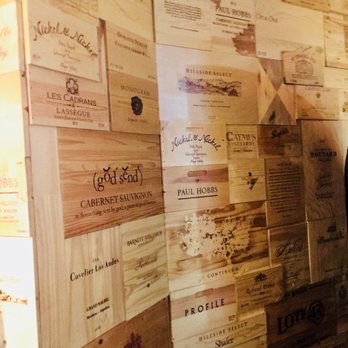 The Vineyard Winemarket - Beautiful wall lined with wine crates. Love this!! - Wine Bars Near Me - Smyrna, Georgia