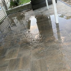 Furtado Landscaping - Patio not pitched correctly.