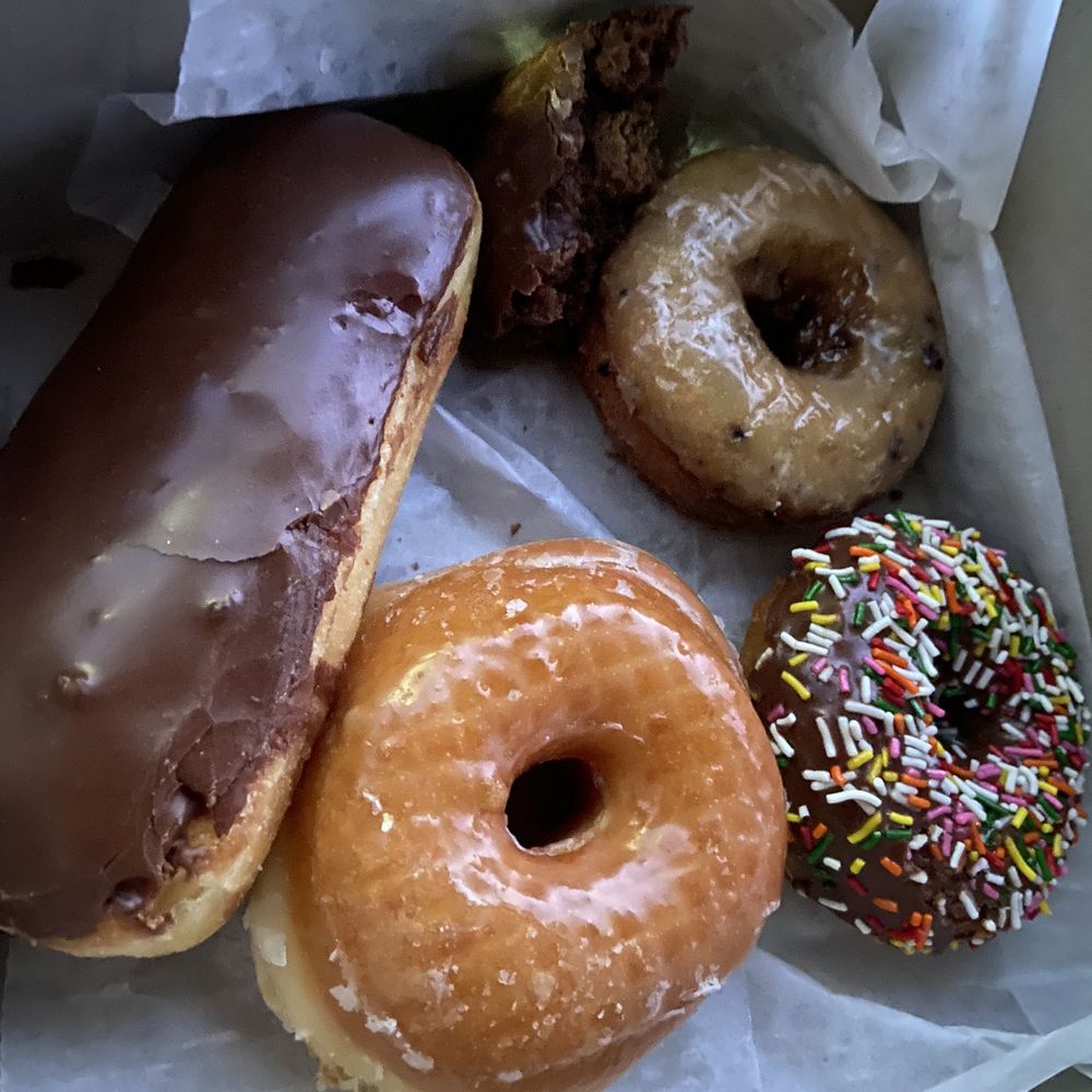 Chocolate bar, glazed donut, chocolate cake with sprinkles, blueberry donut Chocolate bar, glazed donut, chocolate cake with sprinkles, blueberry donut