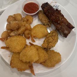 Saturday menu includes coconut shrimp, breaded shrimp, ribs and chicken wings....all you care to eat