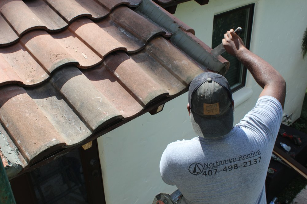 Slide of Northmen Roofing