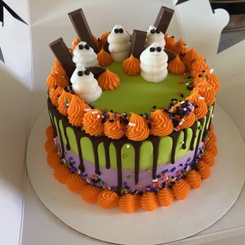 Dunkin' -  a halloween cake with orange frosting and sprinkles - Donuts Near Me - Boerne, Texas