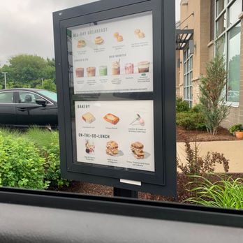 Starbucks - a menu board in front of a coffee shop - Coffee & Tea Near Me - Pewaukee, Wisconsin Starbucks - a menu board in front of a coffee shop - Coffee & Tea Near Me - Pewaukee, Wisconsin