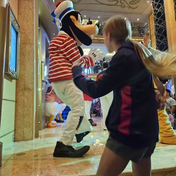 Disney Cruise Line - Dancing with Goofy on Disney Wonder - Transportation Near Me