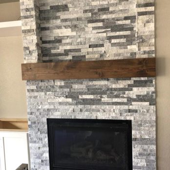 Parra Flooring & Tile - a fireplace - Flooring Near Me - AURORA, Colorado