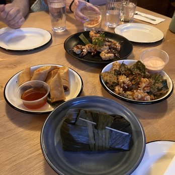 Gai Noi - Egg rolls, mok gai, shrimp skewer, and calamari I think - Desserts Near Me - Minneapolis, Minnesota Gai Noi - Egg rolls, mok gai, shrimp skewer, and calamari I think - Desserts Near Me - Minneapolis, Minnesota