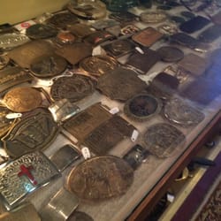 Mr. Johnson's Antiques - A large selection of vintage belt buckles.