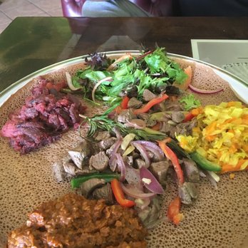 Authentic EthioAfrican - Lentils,lamb,beets & potatoes,salad w/awesome lime/lemon dressing & cabbage & carrots - Ethiopian Near Me - Phoenix, Arizona Authentic EthioAfrican - Lentils,lamb,beets & potatoes,salad w/awesome lime/lemon dressing & cabbage & carrots - Ethiopian Near Me - Phoenix, Arizona