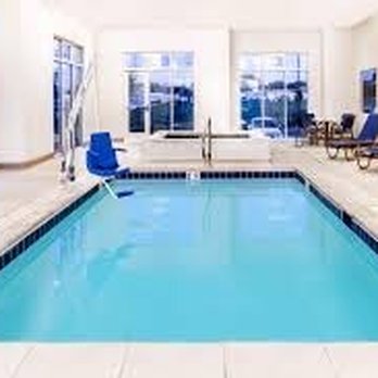 Microtel Inn & Suites by Wyndham - Sweet clean pool and spa area. - Hotels Near Me - Naples, Utah Microtel Inn & Suites by Wyndham - Sweet clean pool and spa area. - Hotels Near Me - Naples, Utah