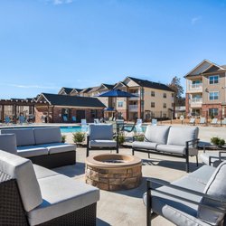 Center Pointe West - Relax around the firepit near the resort style pool.