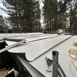 installing TPO flat roofing. installing TPO flat roofing.