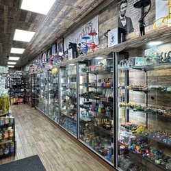 Prime Tobacco Zone - Have all type of grinders from electric to regular and also every kind of design of bongs and raw collect them pieces