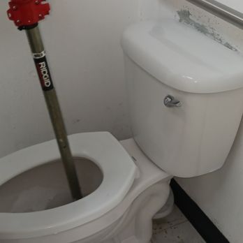 Same Day Plumbing - Bryan is Augering a commode to clear a clog. - Plumbing Near Me Same Day Plumbing - Bryan is Augering a commode to clear a clog. - Plumbing Near Me