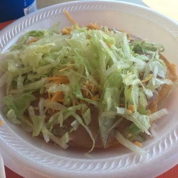 Poncho's Mexican Food - Bean tostada, huge and could be-great, but never had one with out chopped tomatoes. - Mexican Near Me - Casper, Wyoming Poncho's Mexican Food - Bean tostada, huge and could be-great, but never had one with out chopped tomatoes. - Mexican Near Me - Casper, Wyoming