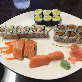 Sakura - Oshinko roll (top), philly roll (left), sweet potato tempura roll (right), salmon sashimi (bottom). - Sushi Bars Near Me - Ogden, Utah