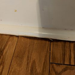 Dustless Hardwood Refinishing - Old stain visible. One example of many