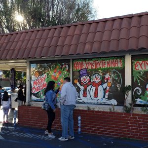 Photo of Dino's Chicken and Burgers - Los Angeles, CA, United States. Still busy at 3 PM but people were respective of space.