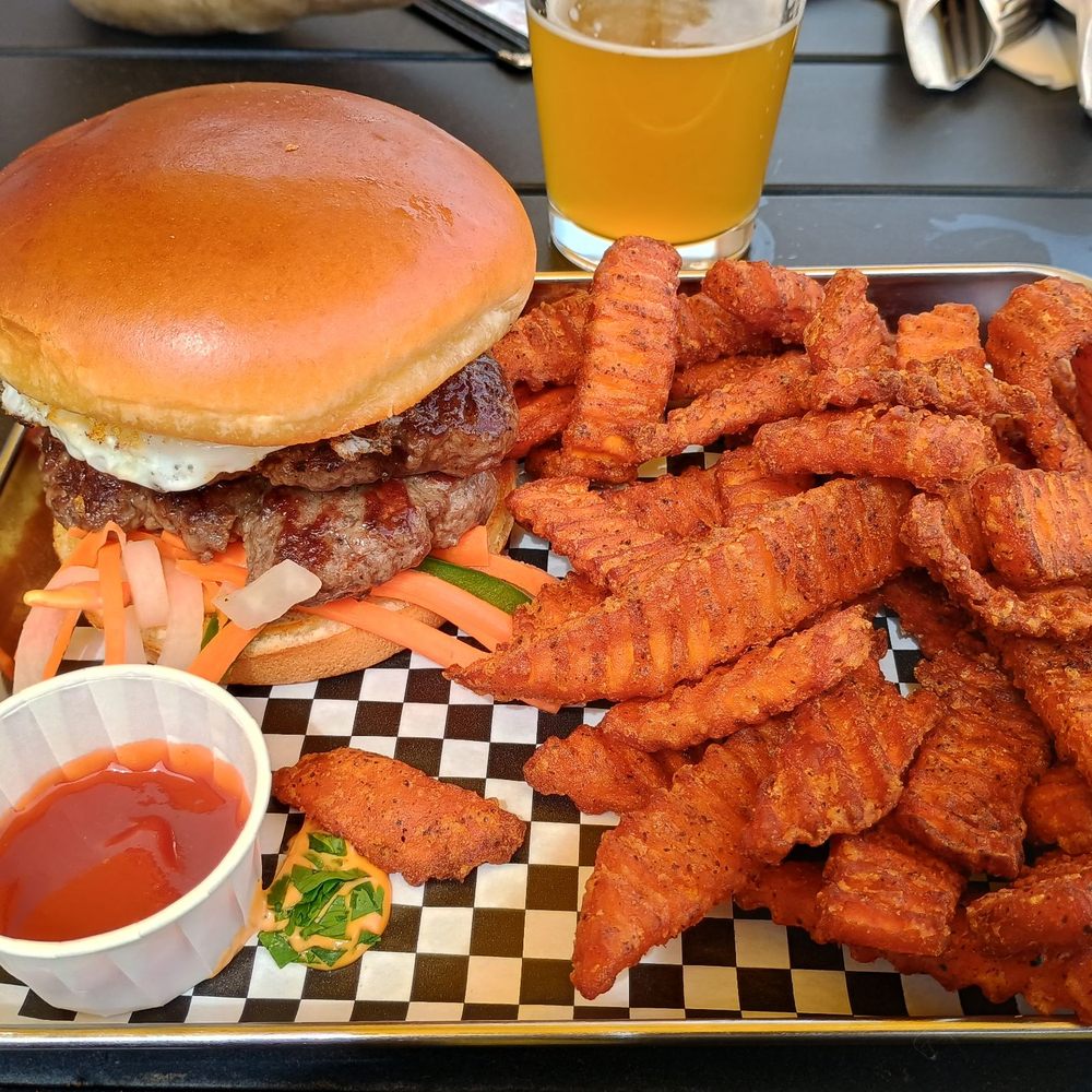The Kosmos - Banh Mi Burger with sweet potato fries. - Bars Near Me - Albuquerque, New Mexico