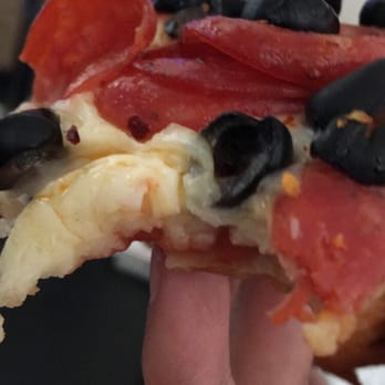 Enzo's Pizza - Crust was undercooked from top to around the middle it was almost non existent , cheese was delicious and toppings were good too - Pizza Near Me - Riverside, California