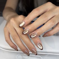 Why Nail - Lily made it for customers. Champagne cat's eye and chocolate French.