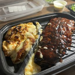 9oz. Parmesan Crusted Chicken with Half-Rack Baby Back Ribs