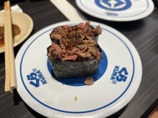 Kura Revolving Sushi Bar by null