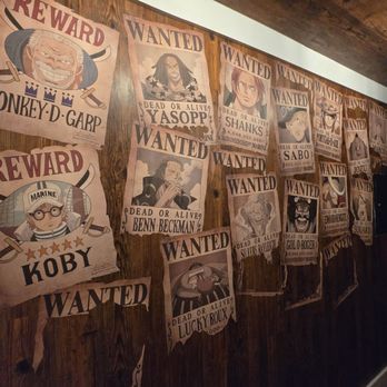 One Piece Cafe - Bounty Posters in front of restroom - Themed Cafes Near Me - Los Angeles, California One Piece Cafe - Bounty Posters in front of restroom - Themed Cafes Near Me - Los Angeles, California