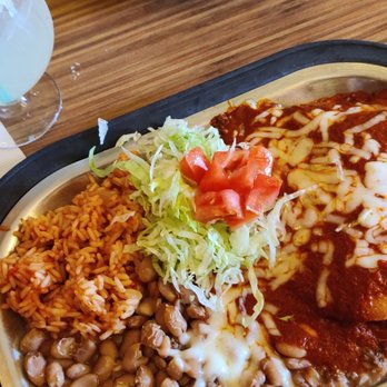 Tomasita's - This is a plate of enchiladas and a house margarita oh and I would say that the beans two were undercooked or old. - New Mexican Cuisine Near Me - Santa Fe, New Mexico