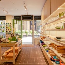 David Mellor - The view towards the entrance from inside with tableware products on display in the shop.