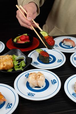 Kura Revolving Sushi Bar by null