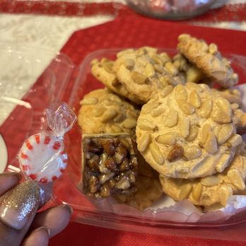 Aliotta Pastry Shop - Peppermint candy to show size comparison for the pecan bites (on the smaller side, but very sweet) Pignoli Cookie on the right - Bakeries Near Me - Brooklyn, New York Aliotta Pastry Shop - Peppermint candy to show size comparison for the pecan bites (on the smaller side, but very sweet) Pignoli Cookie on the right - Bakeries Near Me - Brooklyn, New York
