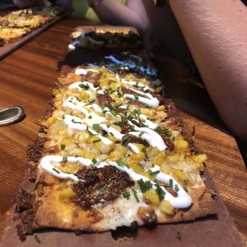 Seasons 52 - Flatbread, this had corn and spicy bacon - New American Near Me - Lone Tree, Colorado