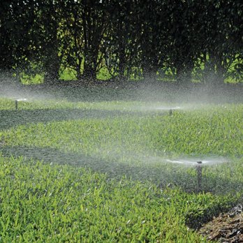 Spartan Irrigation - a sprinkler spraying water on a lawn - Lawn Services Near Me - Lansing, Michigan Spartan Irrigation - a sprinkler spraying water on a lawn - Lawn Services Near Me - Lansing, Michigan