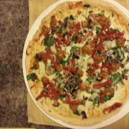 Spicy fennel sausage gourmet delight with spinach, mushrooms and sun dried tomatoes.