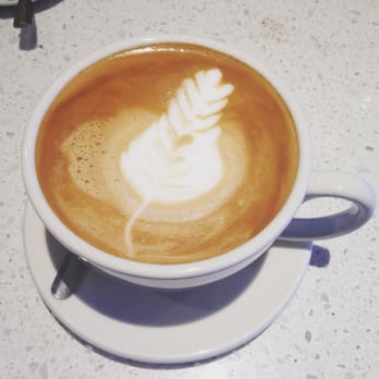 Blenz - a cup of cappuccino on a saucer - Coffee & Tea Near Me - West Kelowna, British Columbia