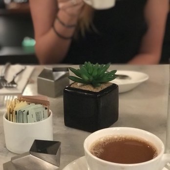 Vaudeville - The coffee service is charming with its metal milk cartons. - New American Near Me - Fredericksburg, Texas