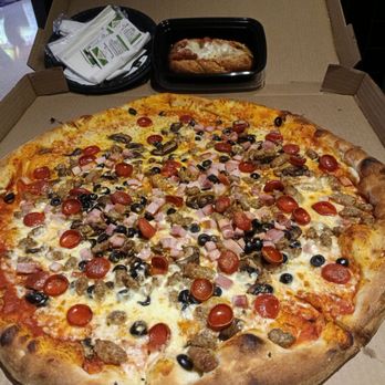 Palms Pizza - This is the full pie meat plus mushrooms and olives. Parmesan chicken #Sanmitch. - Pizza Near Me - Las Vegas, Nevada Palms Pizza - This is the full pie meat plus mushrooms and olives. Parmesan chicken #Sanmitch. - Pizza Near Me - Las Vegas, Nevada