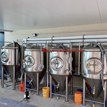 Bayboro Brewing - Outdoor area with brewinf equipment - Breweries Near Me - St. Petersburg, Florida Bayboro Brewing - Outdoor area with brewinf equipment - Breweries Near Me - St. Petersburg, Florida
