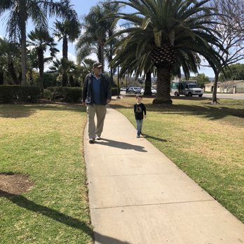 Woodland Park - Grandpa and grandson walking in the park - Parks Near Me - San Marcos, California