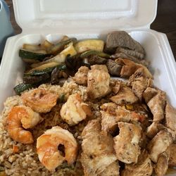 Savage Hibachi & Sushi - Steak had no sear or flavor . Everything was just seasoned with garlic powder . Rice was hard . Veggies no flavor .