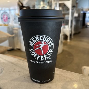 Mercurys Coffee - Extra delicious hot chocolate made with hemp milk. Coffee processing machine in background. - Coffee & Tea Near Me - Bellevue, Washington Mercurys Coffee - Extra delicious hot chocolate made with hemp milk. Coffee processing machine in background. - Coffee & Tea Near Me - Bellevue, Washington