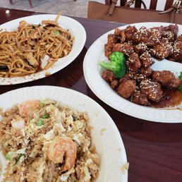 three plates of food on a table three plates of food on a table