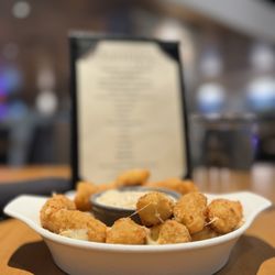 Hanna's Table - Cheese Curds @ a great happy hour. Delicious dip came with them. Cooked perfect
