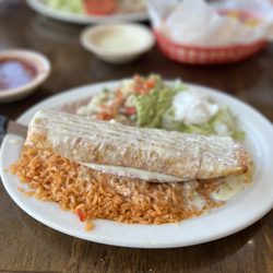 El Tapatio Tres - Chicken Chimichanga. Rice and beans. Delicious. Every time. Every week. Great service. Friendly staff.