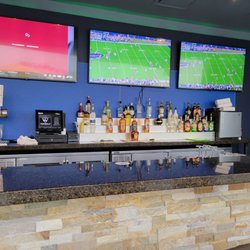 Bar at the lounge. Nice tvs