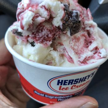 The Inside Scoop - a hand holding a cup of ice cream - Desserts Near Me - Cooperstown, New York The Inside Scoop - a hand holding a cup of ice cream - Desserts Near Me - Cooperstown, New York