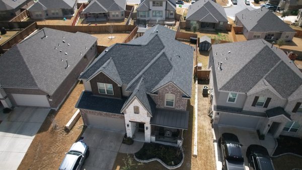 Blues Crews Roofing & Gutters Logo